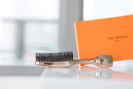 The Brashu Revo Multifunctional comb for washing the scalp, massage and styling