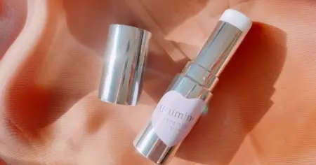 Kose Cosmeport Urumina+ Raw Glossy Skin Melty Stick Serum stick for moisturizing over makeup