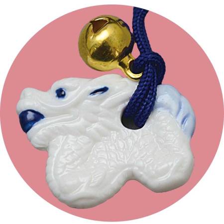 Figurine-mascot Dragon - a symbol of 2024 with New Year's prediction