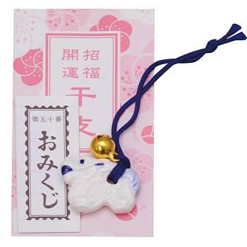 Figurine-mascot Dragon - a symbol of 2024 with New Year's prediction